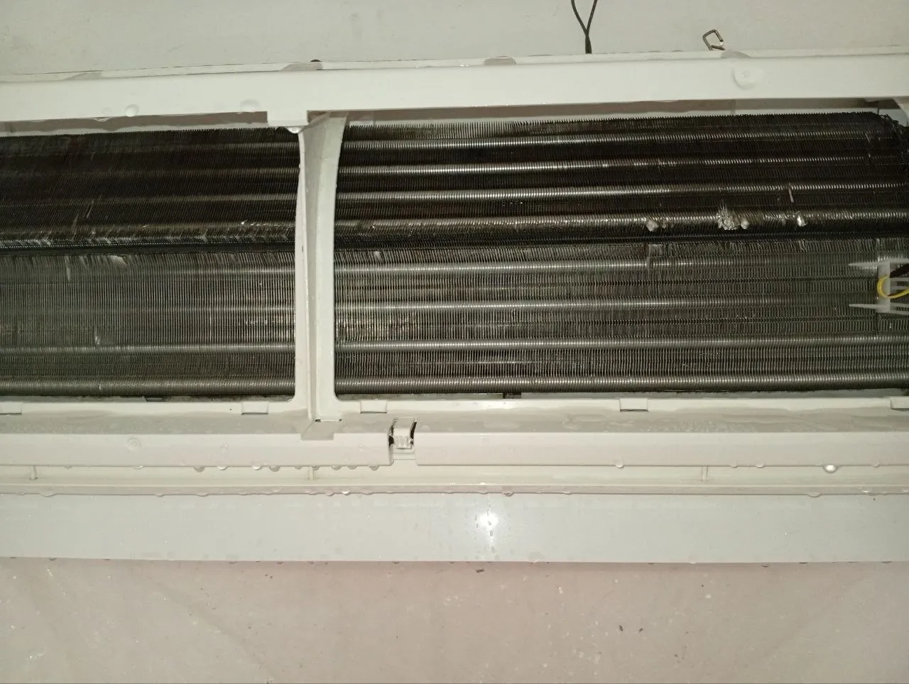 Clean AC evaporator coil after chemical wash in Bali
